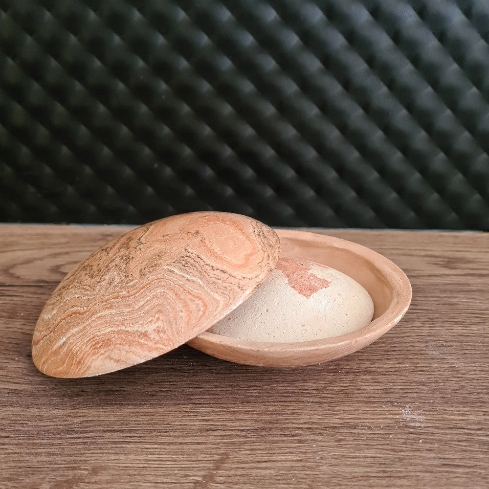 Écrin orangé unique pour Galet Exfoliant